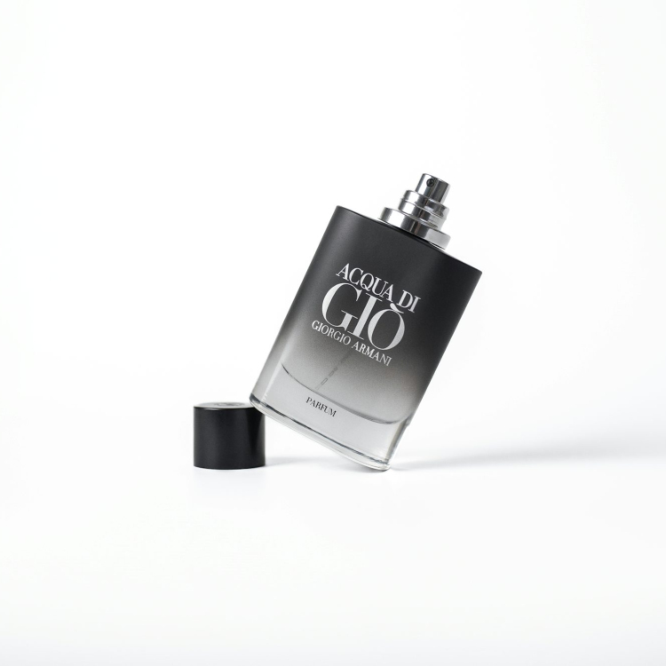 A black and silver flask with a black cap