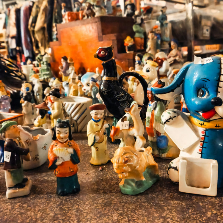 A bunch of figurines that are on the ground