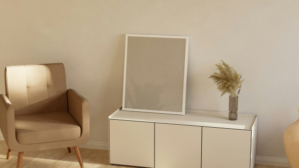 A chair and a mirror in a room