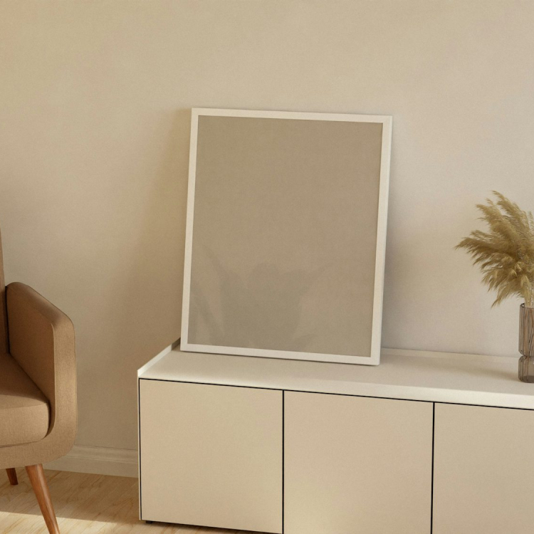 A chair and a mirror in a room