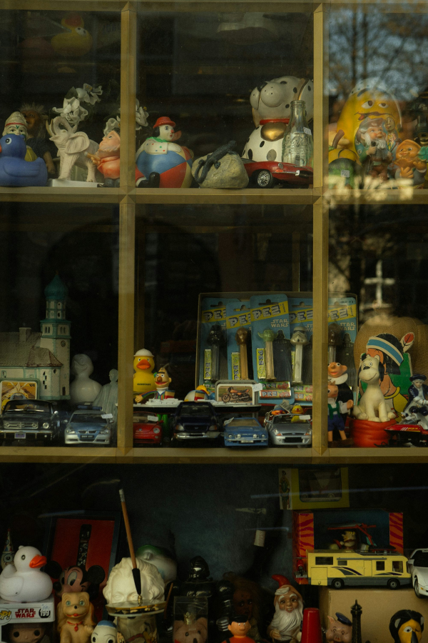 A display case filled with lots of toys