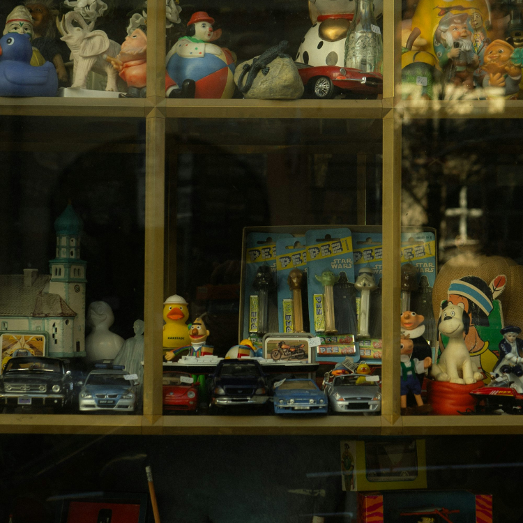 A display case filled with lots of toys