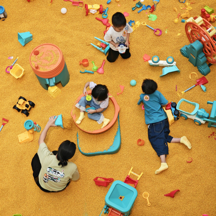 A group of children playing in a play area