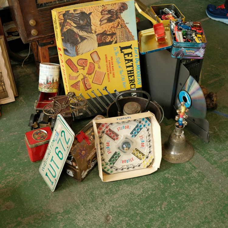 A pile of assorted items sitting on the floor
