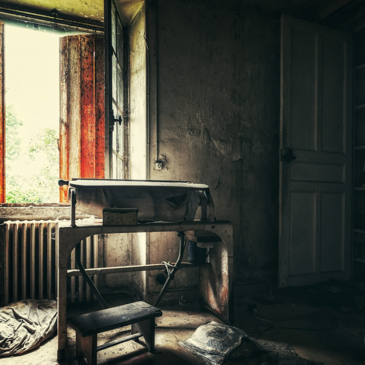 A room with a chair and a window