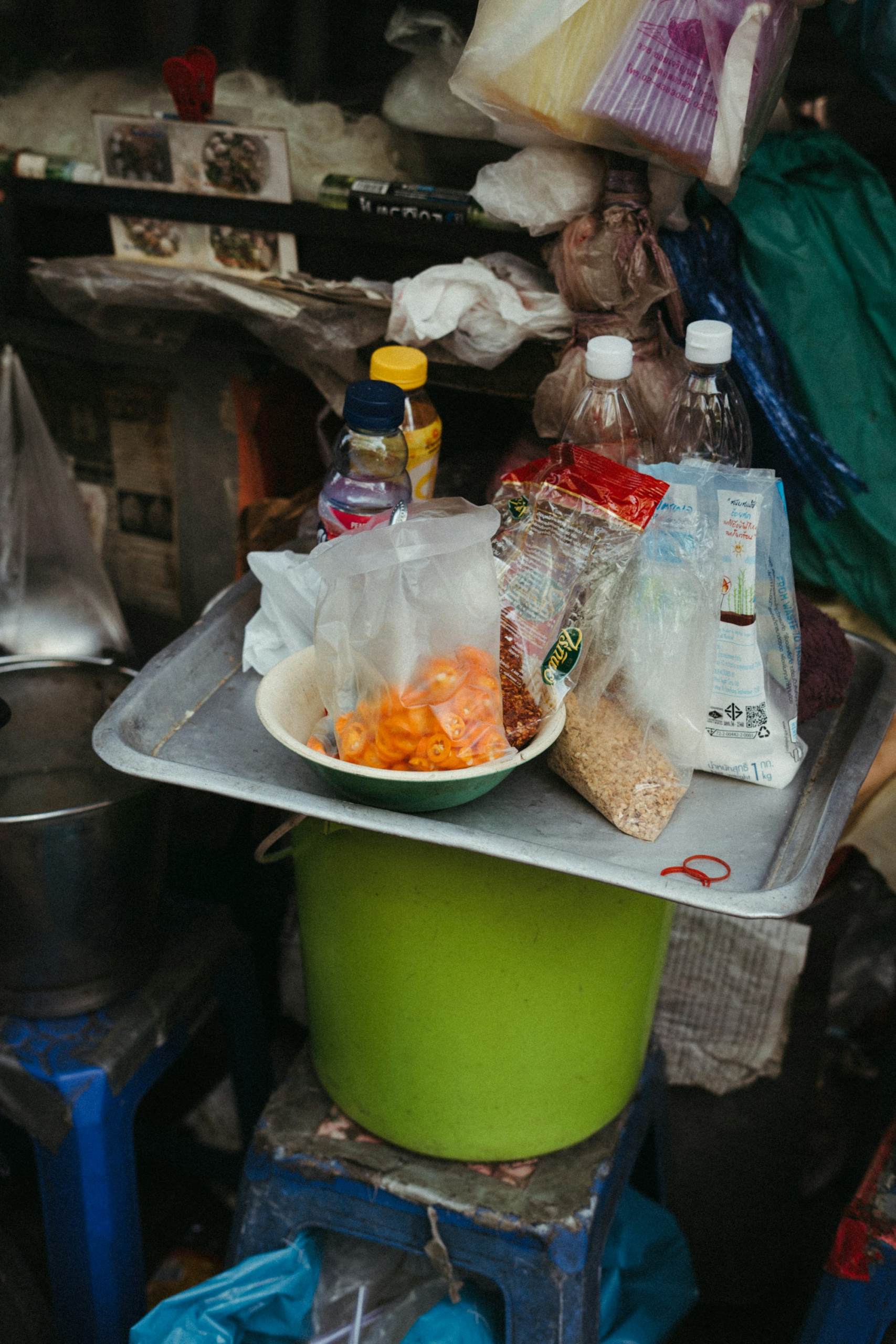 A table with a bowl of food on top of it