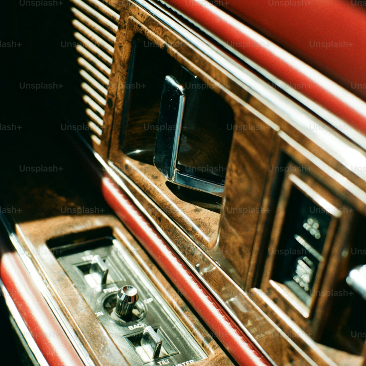 An antique car doors interior details are shown