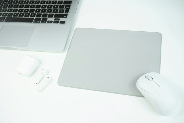 Apple magic mouse beside apple magic mouse