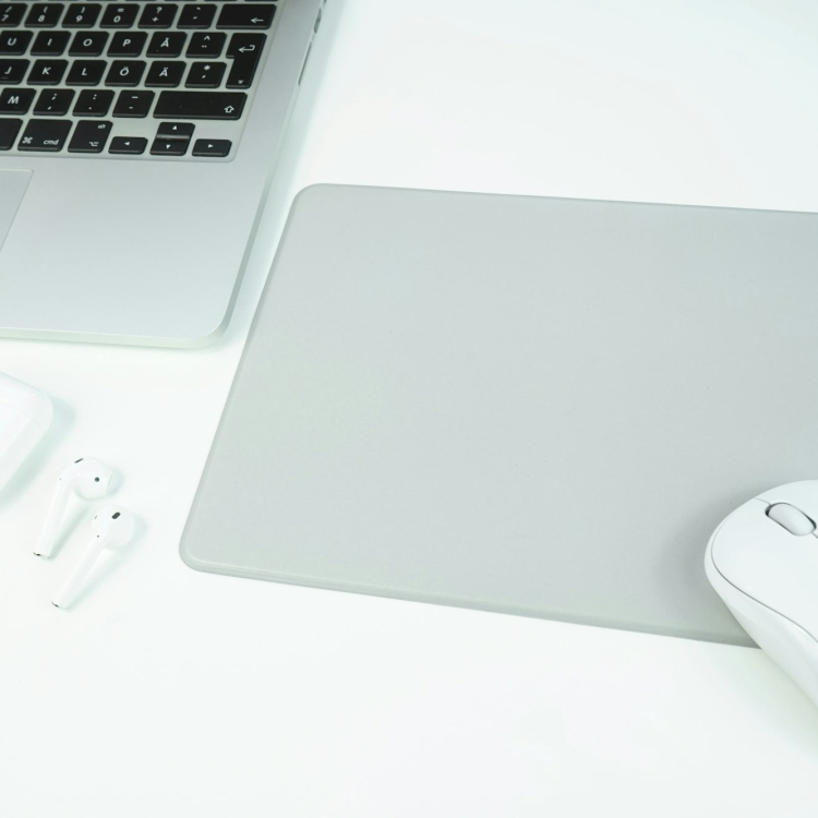 Apple magic mouse beside apple magic mouse