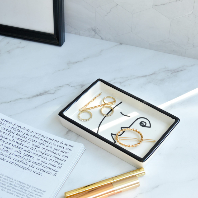 Black framed white and brown floral print on white paper