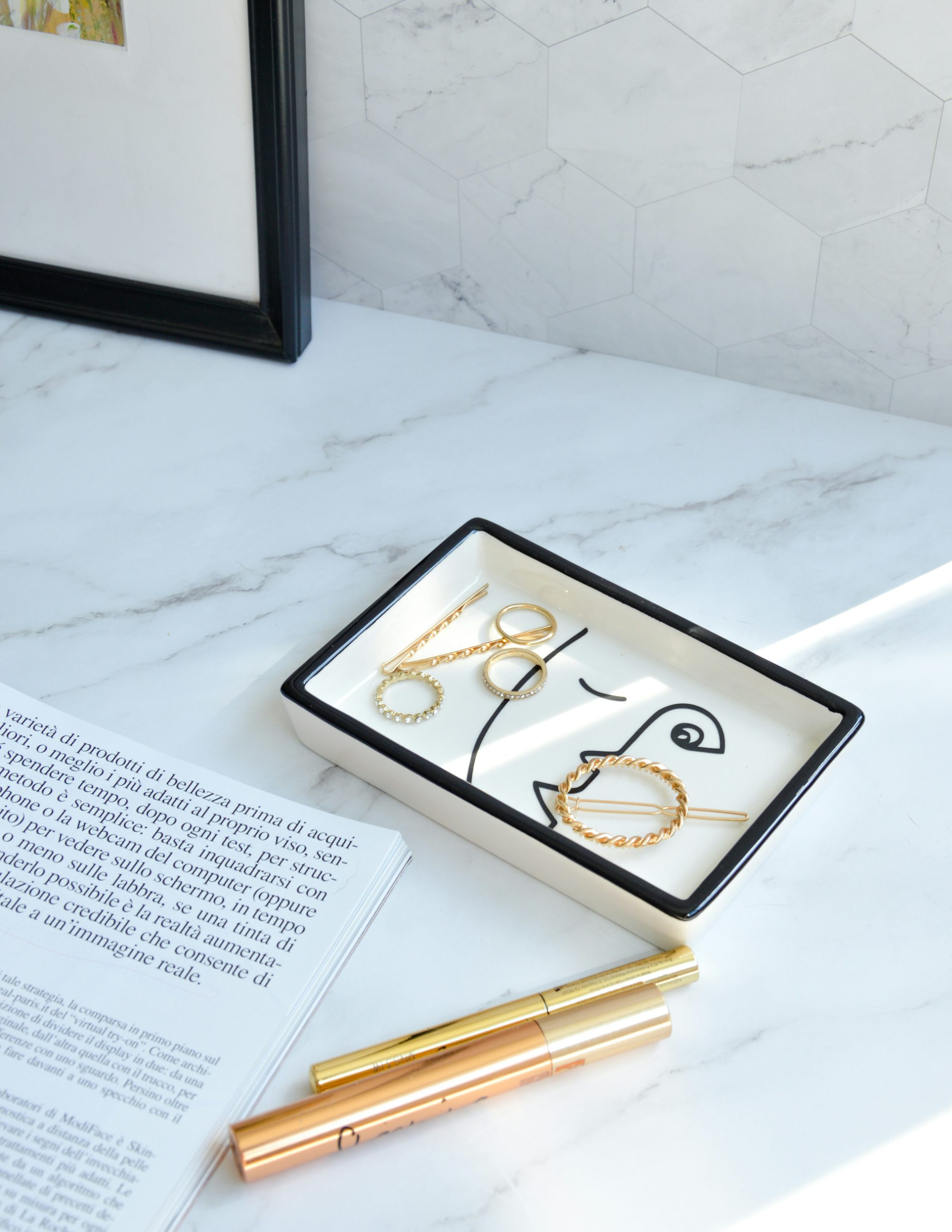 Black framed white and brown floral print on white paper