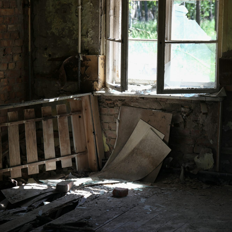 Brown wooden board inside abandoned house