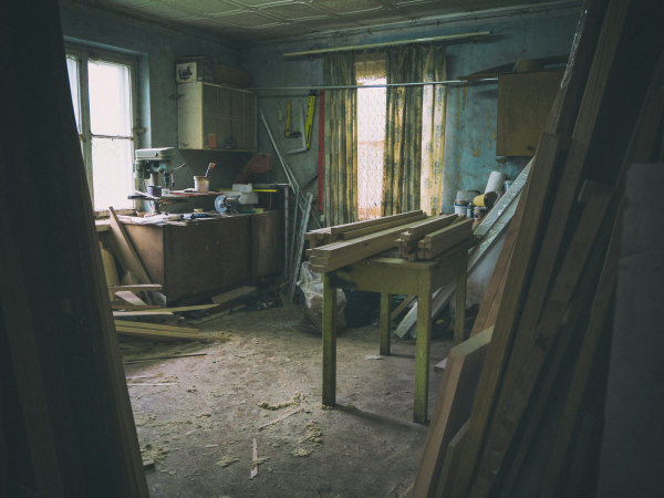 Brown wooden table near window