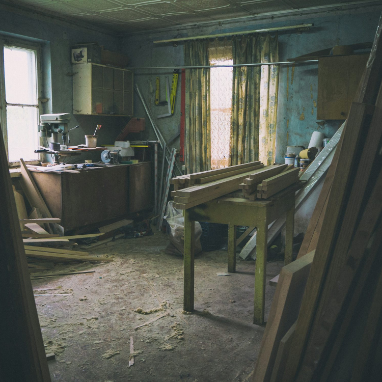 Brown wooden table near window