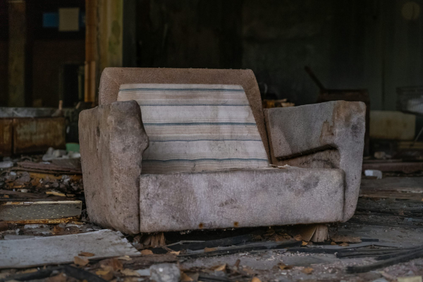 Gray wooden bench on gray concrete floor