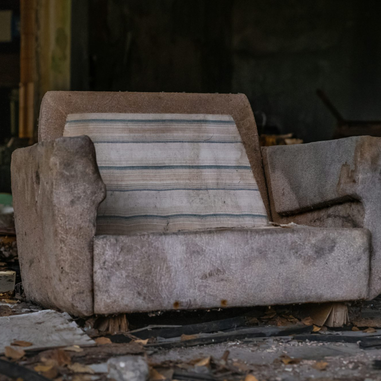 Gray wooden bench on gray concrete floor