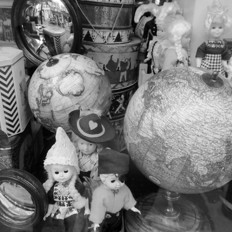 Grayscale photo of snowman and snowman figurines