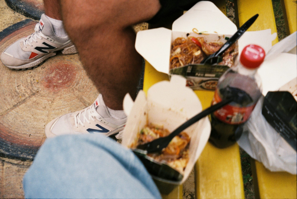 Person in white nike sneakers