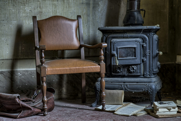 Two black leather padded chairs