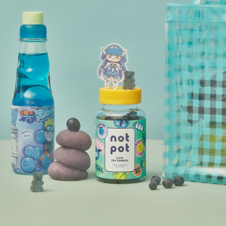 Two blue and yellow plastic bottles