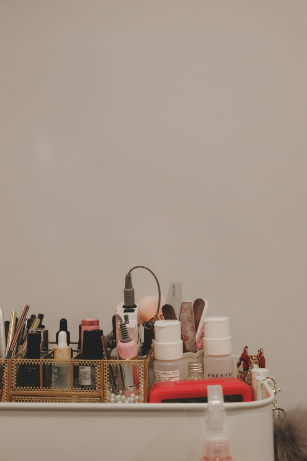 White plastic bottles on white plastic rack