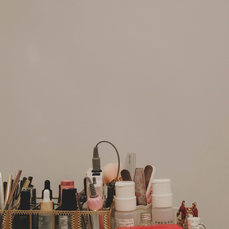 White plastic bottles on white plastic rack