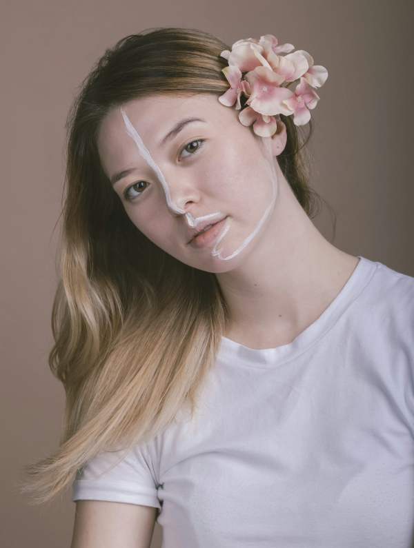 Woman wearing white crew-neck shirt