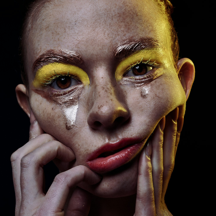 Woman with red lipstick and brown eyes