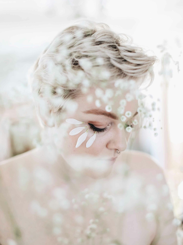 Woman with white floral headdress