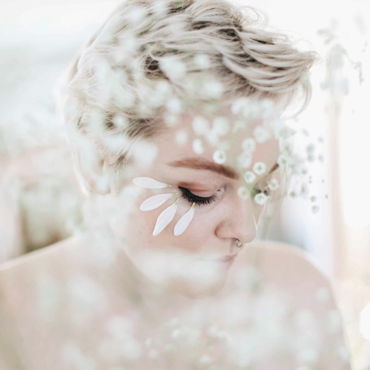 Woman with white floral headdress
